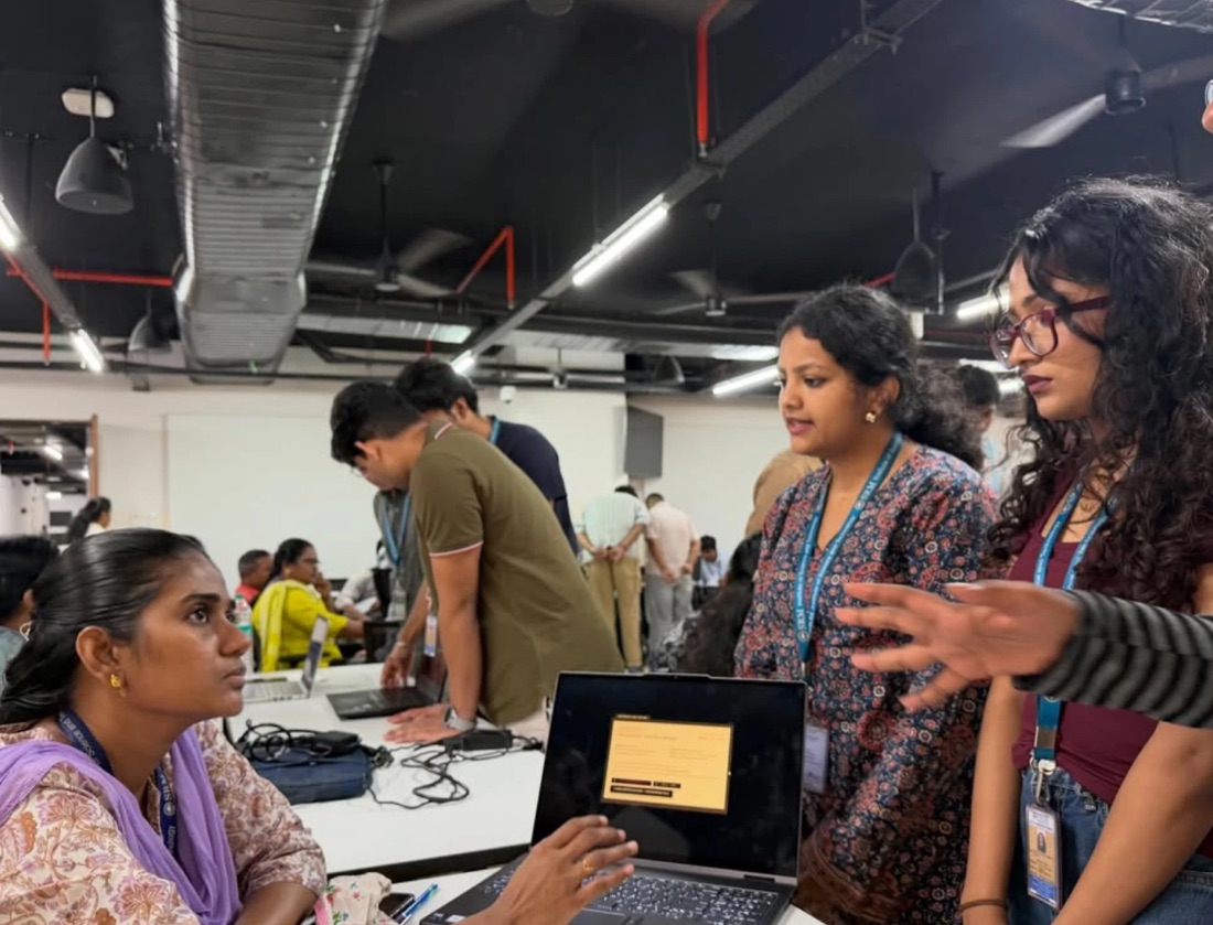 A team walking a judge through their game at Game Jam 2026